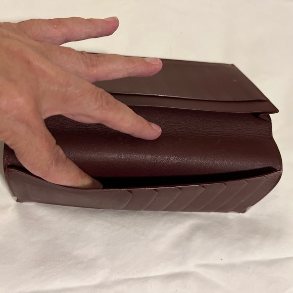 Cartier Calfskin Black long wallet w maroon inside, silver scroll on corners - Picture 9 of 10